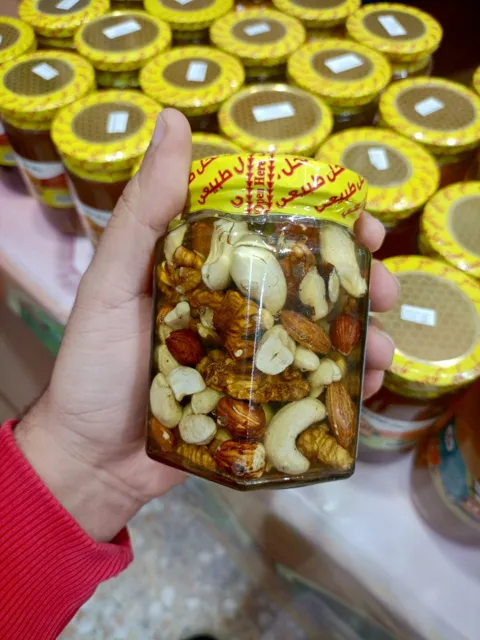 عسل رحيق البرتقال بالمكسرات