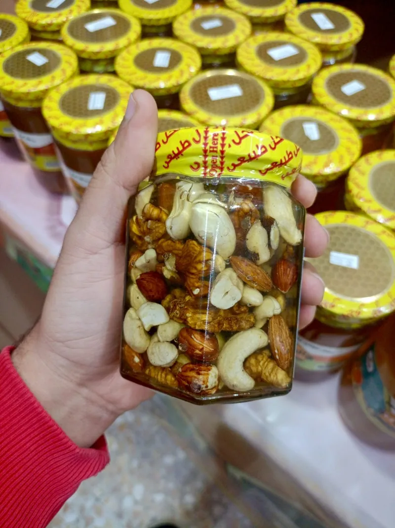 عسل رحيق البرتقال بالمكسرات